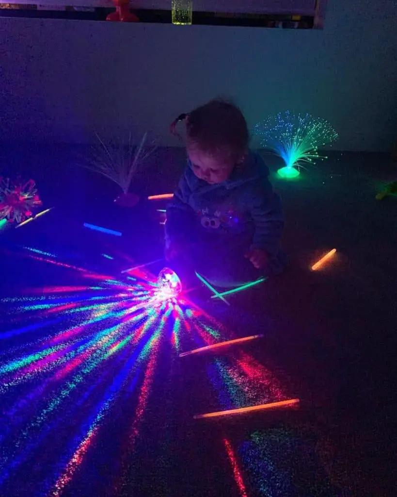 sensory neon lighting with a toddler
